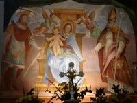 Oratorio della Beata Vergine della Neve - Affresco della seconda metà del XVI secolo raffigurante la Madonna con il Bambino, S. Nazario e S. Gaudenzio Oratorio della Beata Vergine della Neve - Affresco della seconda metà del XVI secolo raffigurante la Madonna con il Bambino, S. Nazario e S. Gaudenzio